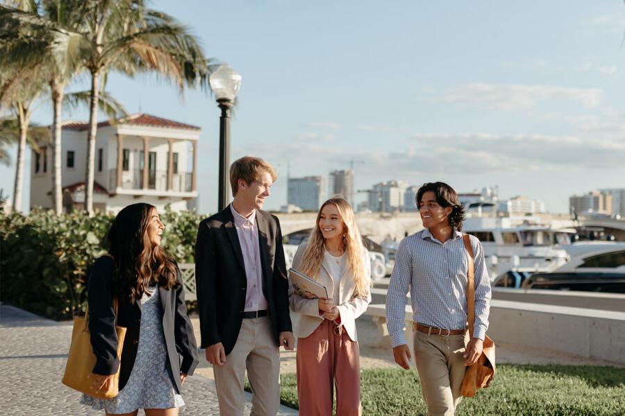 master of business administration mba students walk near the intercoastal waterway in 西<a href='http://2aatje.1opc.net'>推荐全球最大网赌正规平台欢迎您</a>.
